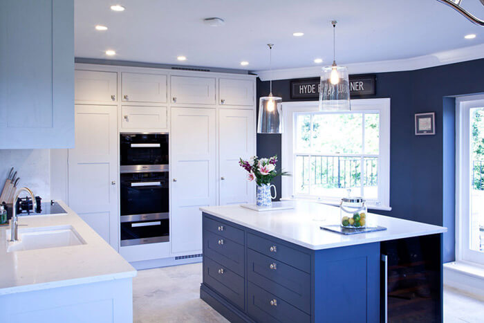 Professionally staged home by Beau Property Home Staging. Show home kitchen featuring colour matched/themed furniture.